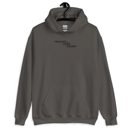 Healing Over Hiding Hoodie – Unisex Heavy Blend with Minimal Embroidery & Meaningful Back Design (Sand, Charcoal, Military Green)