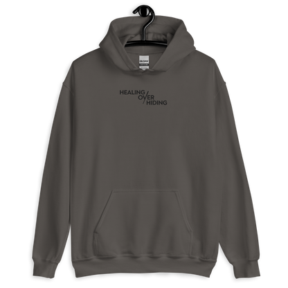 Healing Over Hiding Hoodie – Unisex Heavy Blend with Minimal Embroidery & Meaningful Back Design (Sand, Charcoal, Military Green)