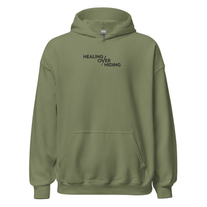 Healing Over Hiding Hoodie – Unisex Heavy Blend with Minimal Embroidery & Meaningful Back Design (Sand, Charcoal, Military Green)